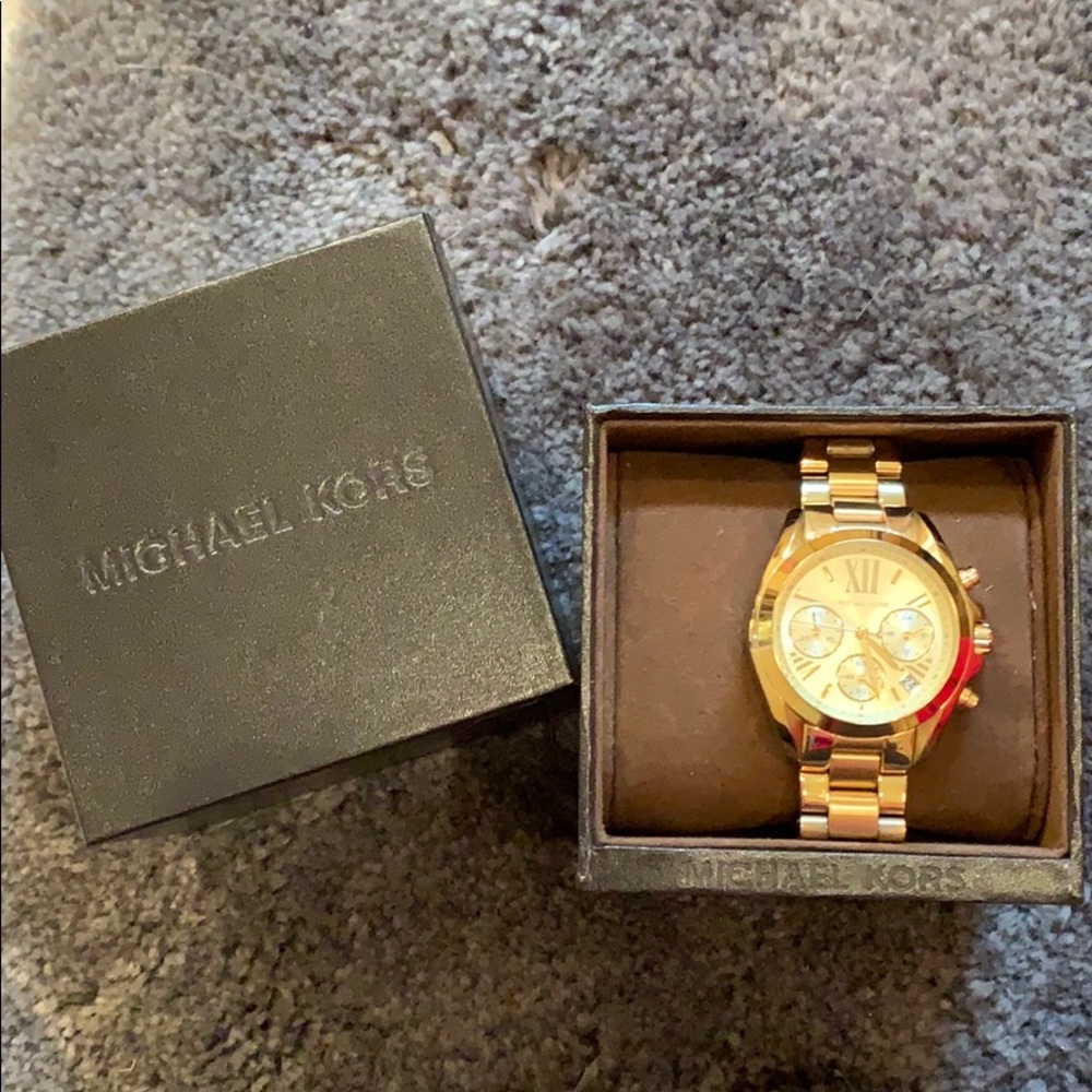 Gold Michael Kors watch.